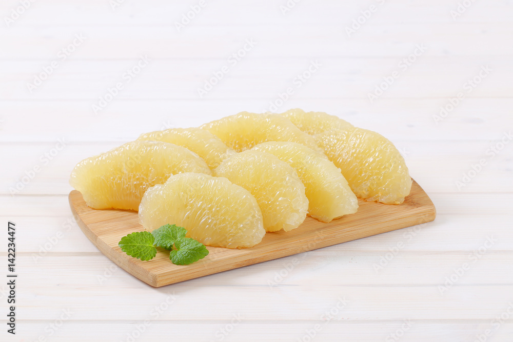 peeled pomelo segments