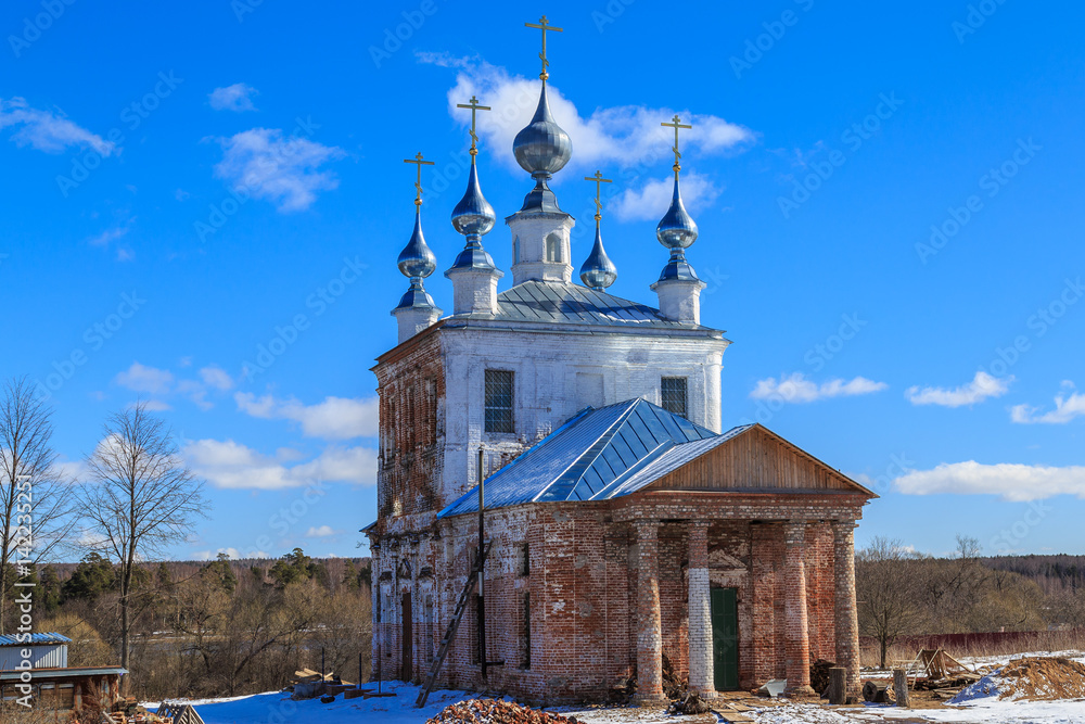 Repair of the temple in a Russian village