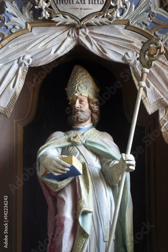 Saint Martin statue at the altar in the Parish Church of Saint Martin in Pisarovinska Jamnica, Croatia on August 21, 2011. photo