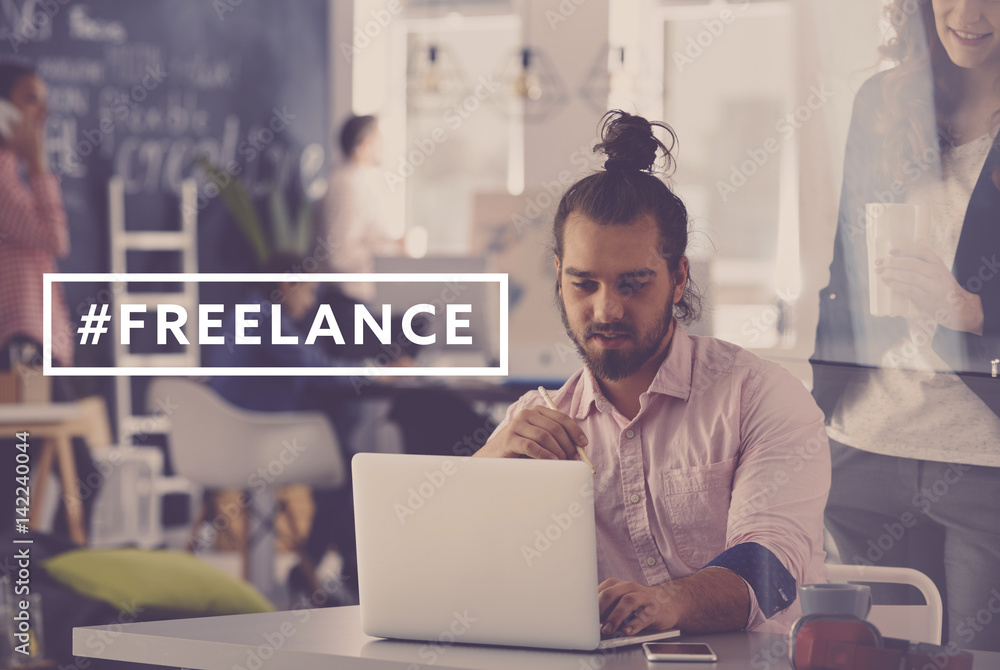 Freelance worker using laptop Freelance worker using laptop