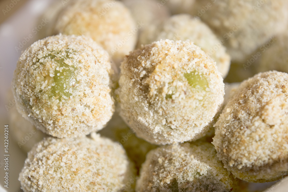 detail of raw stuffed fried olives detail of raw stuffed fried olives