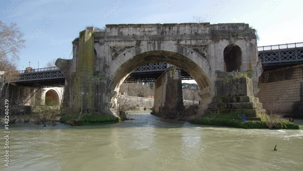 Ponte Rotto ancient destroyed bridge view from the Tiber Island, Rome, Italy