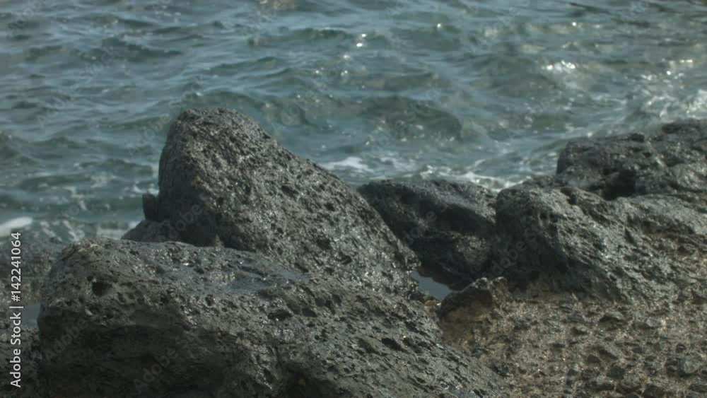 Waves Moving Under Small Rocks Waves Moving Under Small Rocks