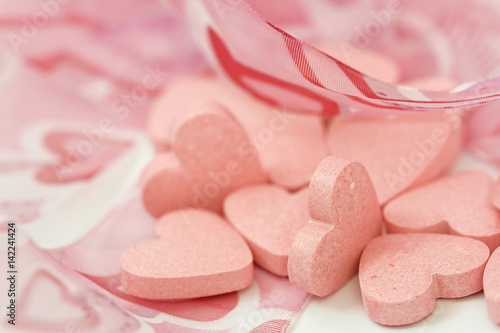 Heart-shaped love candies, macro