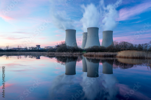 Nuclear power plant with dusk landscape. photo