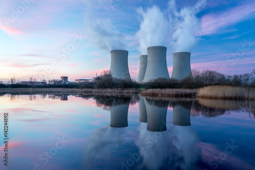 Nuclear power plant with dusk landscape.