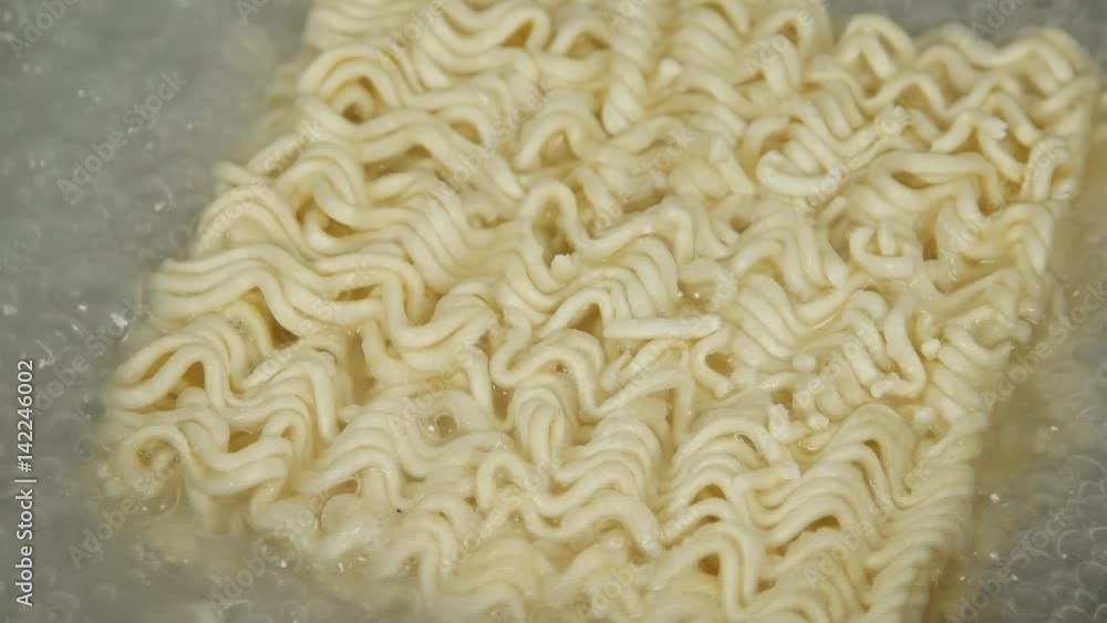 4k of Boiling water with noodles in the pan 4k of Boiling water with noodles in the pan