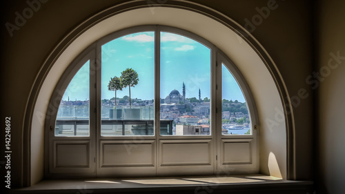 Istanbul, Turkey - March 13, 2013: Brief view of Eminonu and Golden Horn from a window