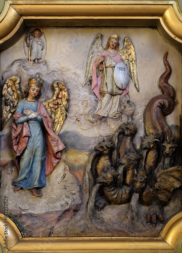 Archangel Michael protector of apocalyptic woman, Saint George altar in the Basilica of the Sacred Heart of Jesus in Zagreb, Croatia 