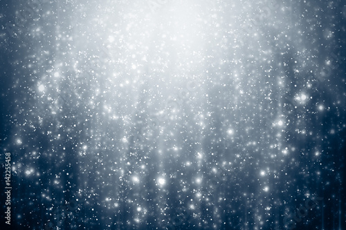 Abstract silver background with white particles. Round bokeh or glitter lights. Design template