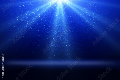 Stage light and blue glitter lights on floor. Abstract background for display your product. Spotlight realistic ray