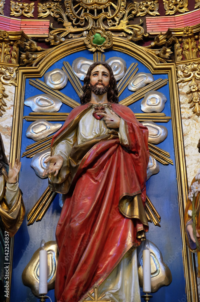 Sacred Heart of Jesus statue at the altar in the church of Saint Catherine of Alexandria in Krapina, Croatia.