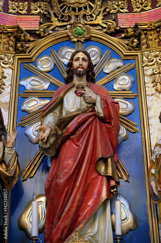 Sacred Heart of Jesus statue at the altar in the church of Saint Catherine of Alexandria in Krapina, Croatia.