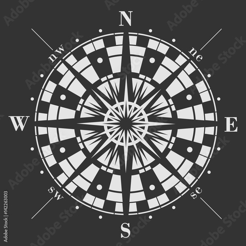 Wind rose icon on black background. Vector compass illustration.