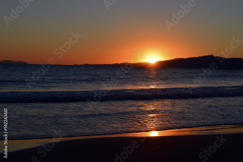 Puesta de sol en la playa en Salou
