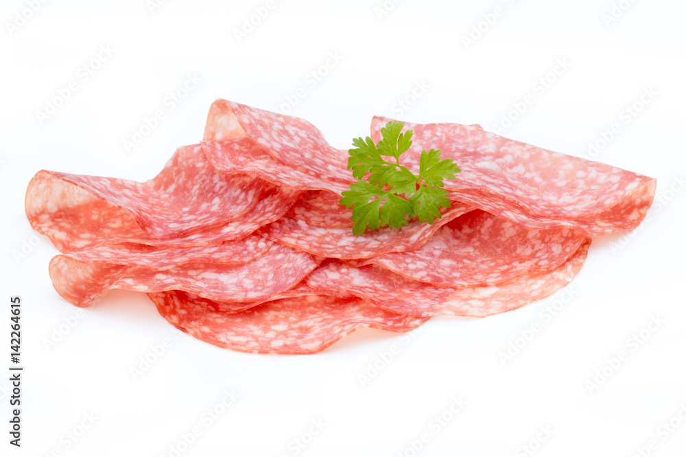Salami smoked sausage slices isolated on white background cutout. Salami smoked sausage slices isolated on white background cutout.