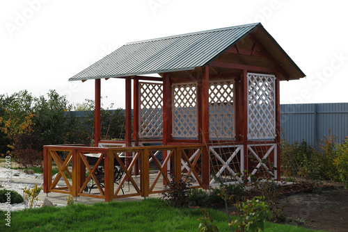 Wooden pavilion in the autumn garden © argot