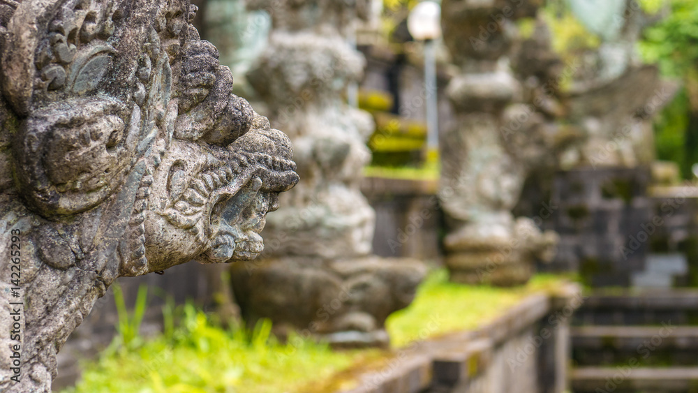 Traditional Balinese stone sculpture art and culture at Bali, Indonesia