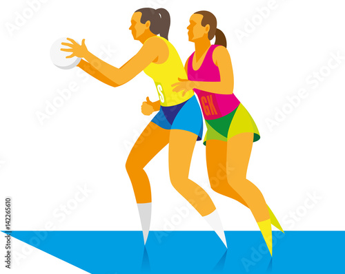 Two young pretty girls playing netball