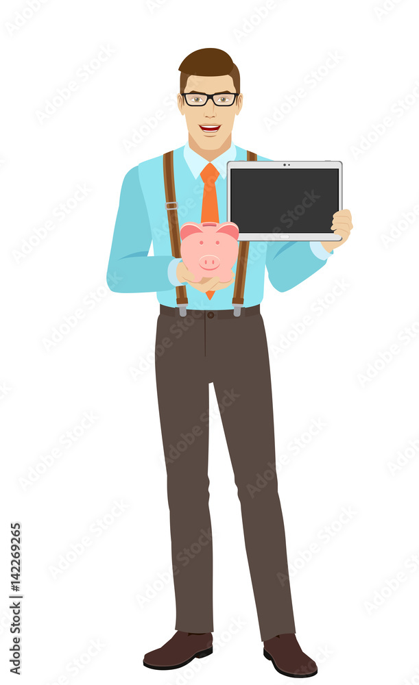Businessman holding a piggy bank and digital tablet Businessman holding a piggy bank and digital tablet