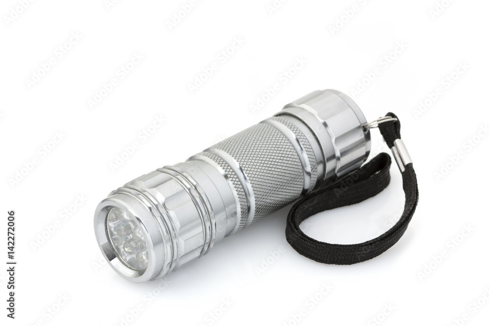 Silver small flashlight (lantern light) isolate on white backgro Silver small flashlight (lantern light) isolate on white backgro