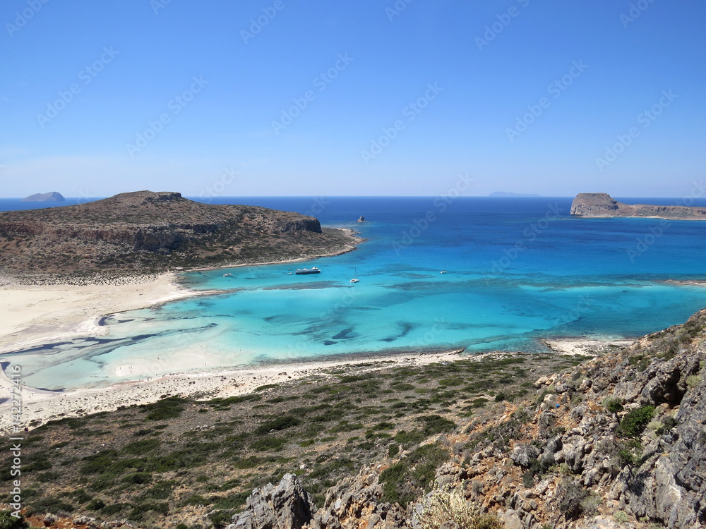 Crystal clear water, sand bars, rocks and islands. Balos Bay, Crete, Greece, Mediterranean Crystal clear water, sand bars, rocks and islands. Balos Bay, Crete, Greece, Mediterranean
