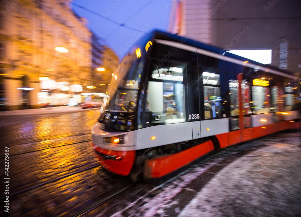 Modern tram in motion blur. - obrazy, fototapety, plakaty 