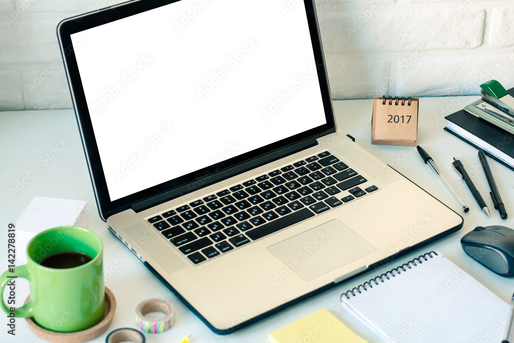 Workspace with laptop notebook stick notes scotch coffee cup on white background. Template mock up place for text Office table desk. Freelancer working place area. Working at home or online concept Workspace with laptop notebook stick notes scotch coffee cup on white background. Template mock up place for text Office table desk. Freelancer working place area. Working at home or online concept