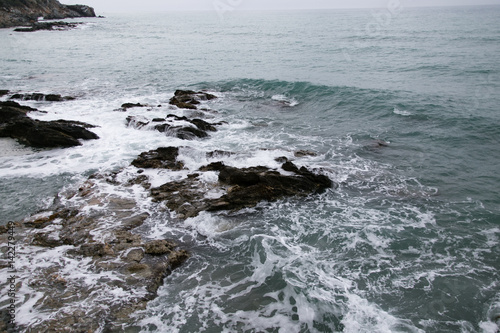 Waves washing rocks