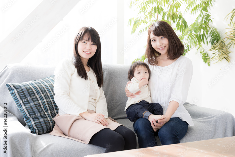 Obraz premium young asian family in living room