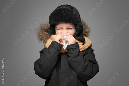Cute little boy in warm clo...