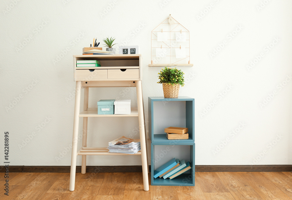 Fototapeta premium High wooden table as stand up work place in modern interior