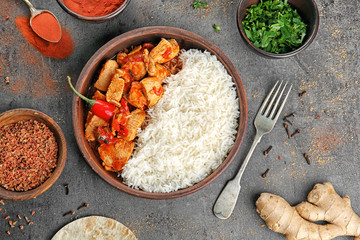 Acrylglasbilder Gewürze Chicken Tikka Masala mit Reis  © Africa Studio