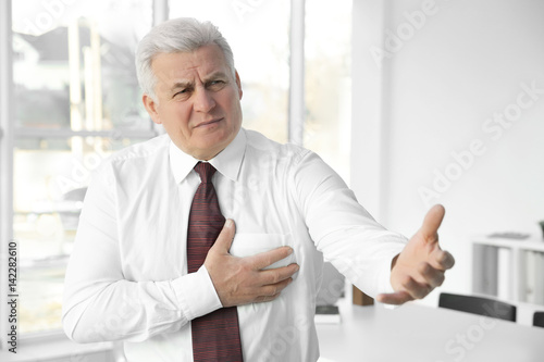 Man with chest pain sufferi...