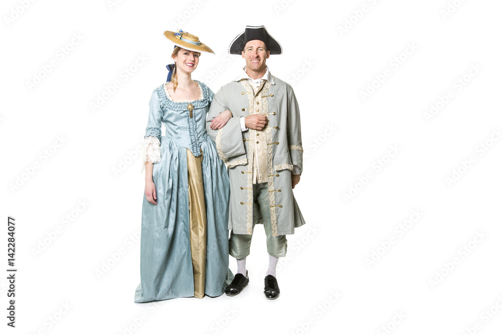 beautiful couple in long medieval dress isolated on white