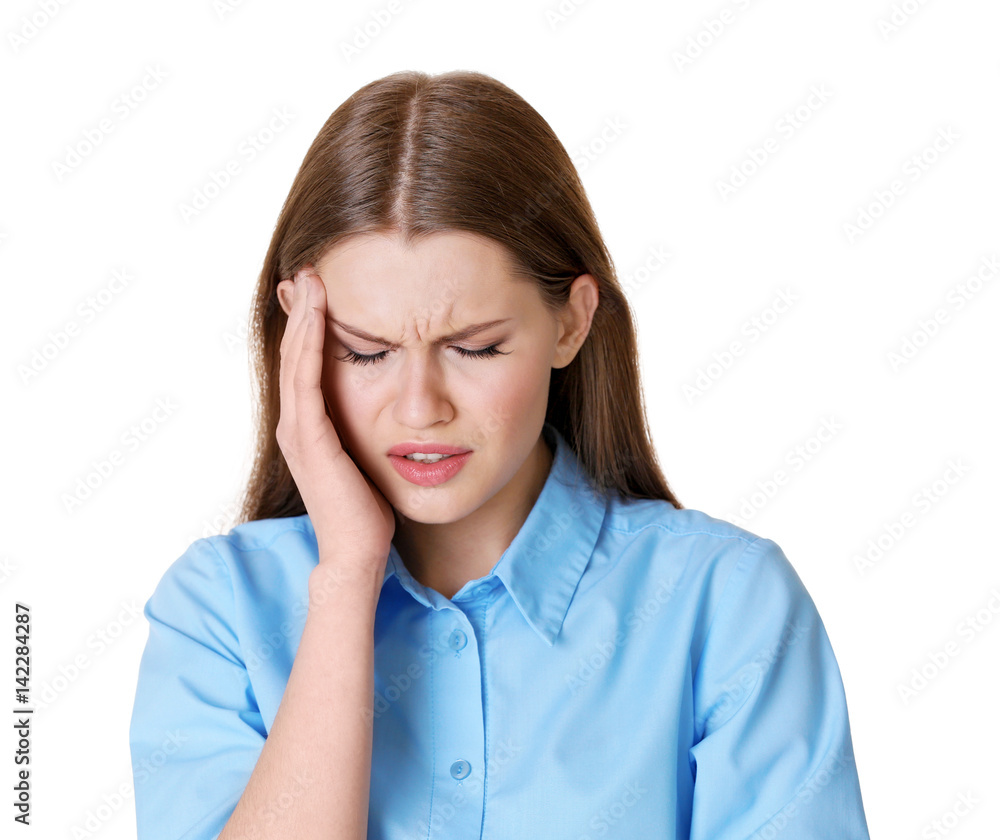 Beautiful young woman suffering from headache on white background Beautiful young woman suffering from headache on white background