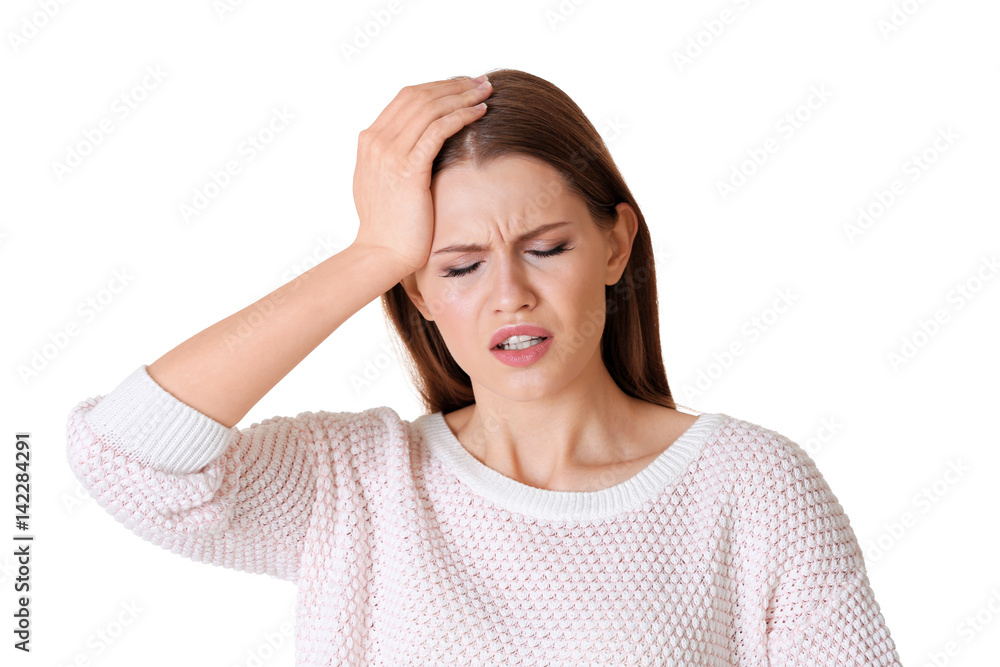 Beautiful young woman suffering from headache on white background Beautiful young woman suffering from headache on white background