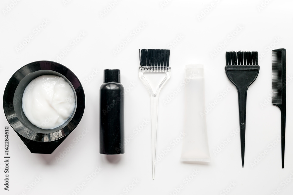 barbershop concept with hairdye tools on white background top view barbershop concept with hairdye tools on white background top view