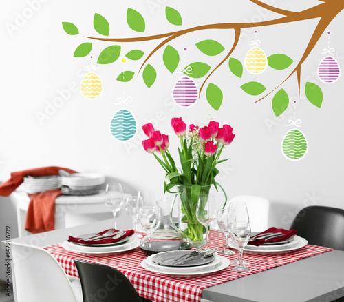 Table served with dishes an...