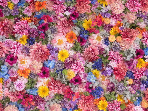 Multi-colored flower wall background   © Tetsuya