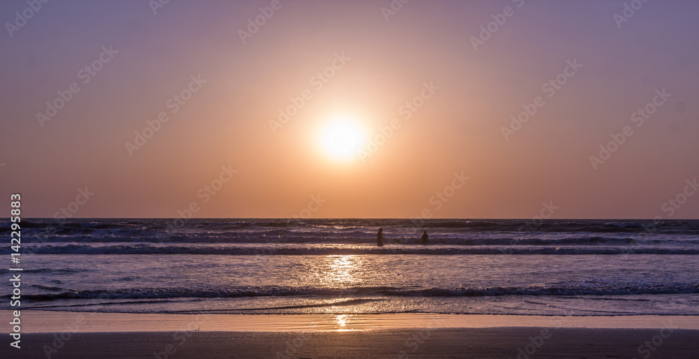 Fototapeta premium Sunset over Arabian sea, Indian ocean, on Arambol beach, Goa, India