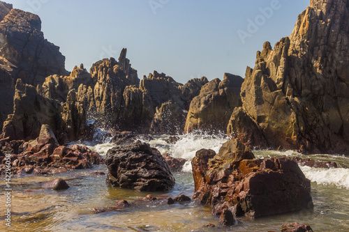 Arabian Sea, North Goa, India, stones on the foreground