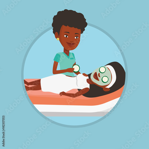 Cosmetologist making beauty treatments to woman.