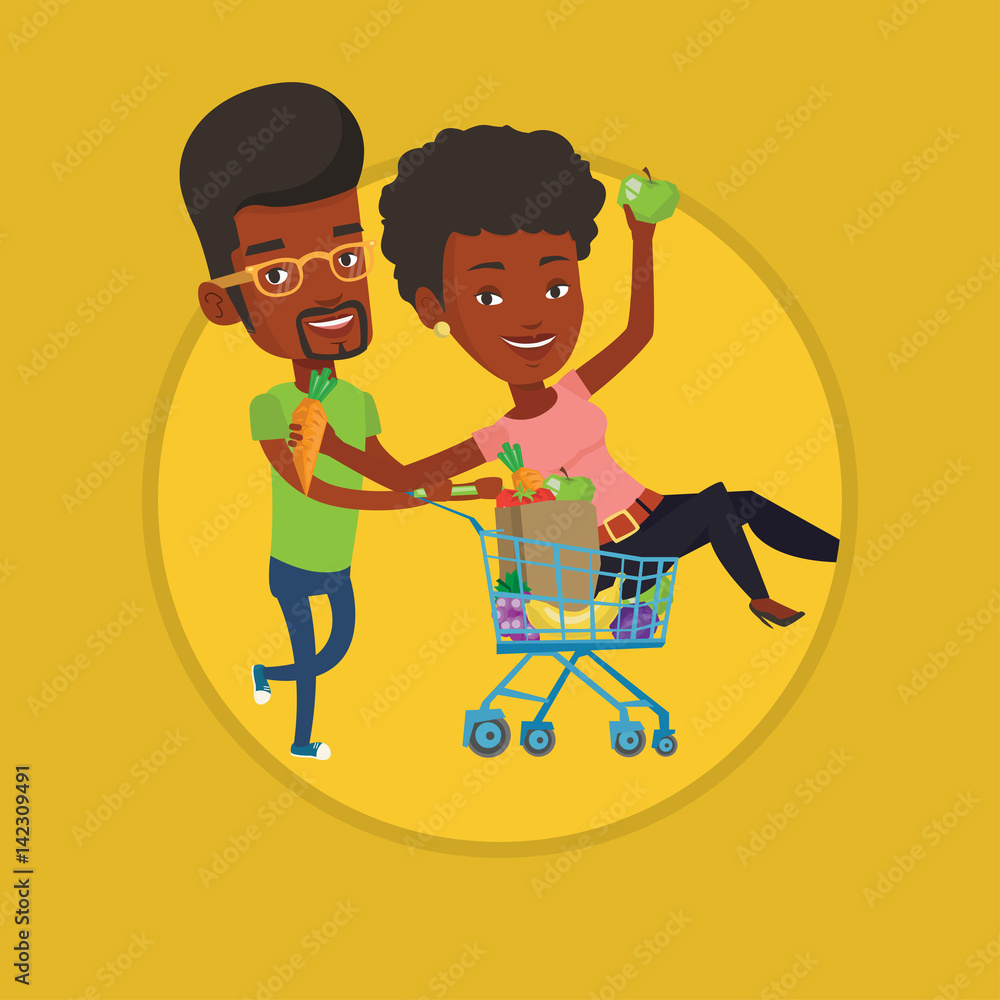 Couple of friends riding by shopping trolley. Couple of friends riding by shopping trolley.