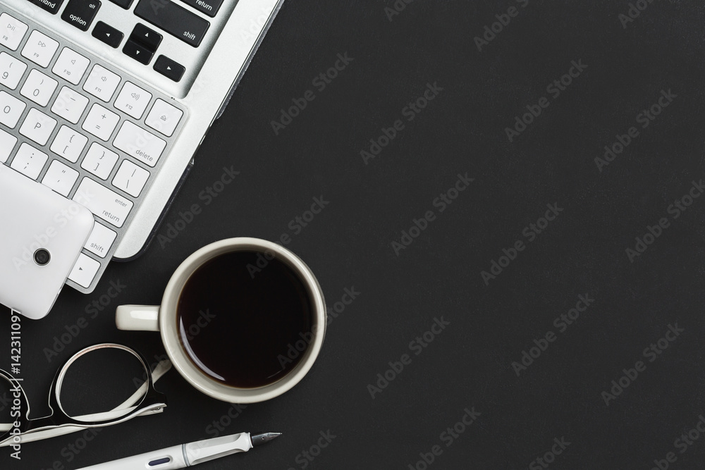 Office desk table black with computer, coffee cup, founten pen, top view photography. Office desk table black with computer, coffee cup, founten pen, top view photography.