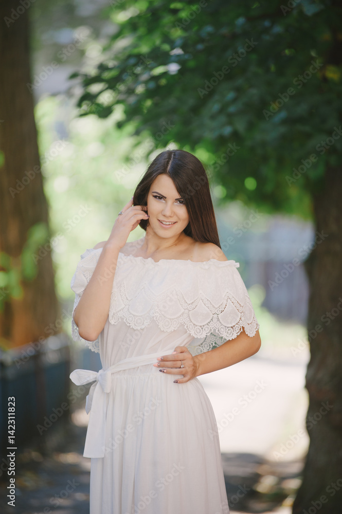 brunette in a dress