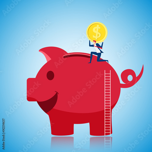 Businessman climbing to the top of giant piggy bank and putting gold coin to save money. Saving money concept.