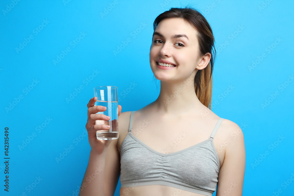 sports girl with a glass of water sports girl with a glass of water
