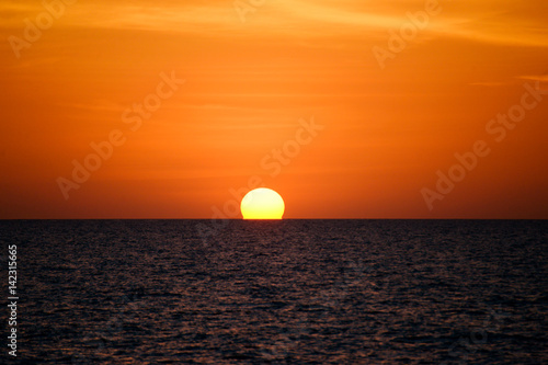 Fantastic sea ocean golden sunset horizon sky photo