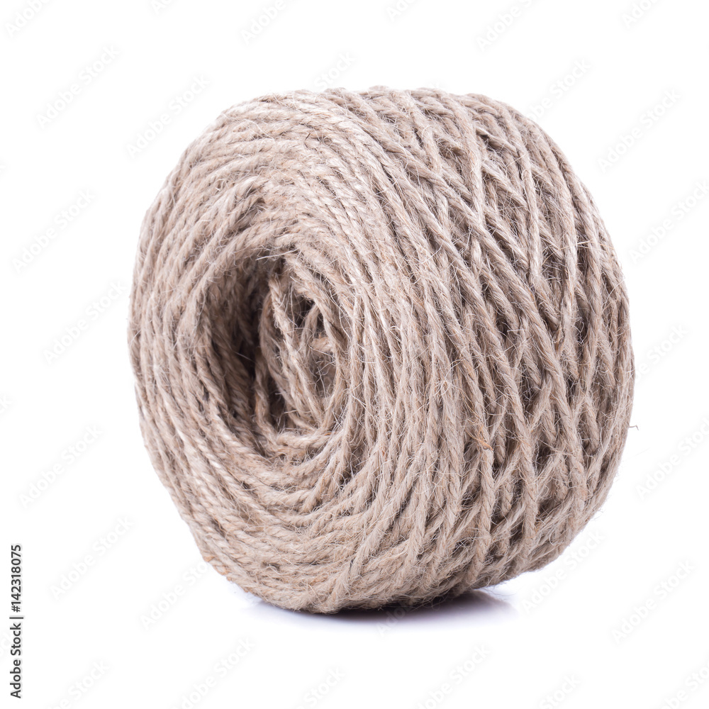 Roll of twine jute on sacking, hemp rope in paper roll isolated on white background. Roll of twine jute on sacking, hemp rope in paper roll isolated on white background.